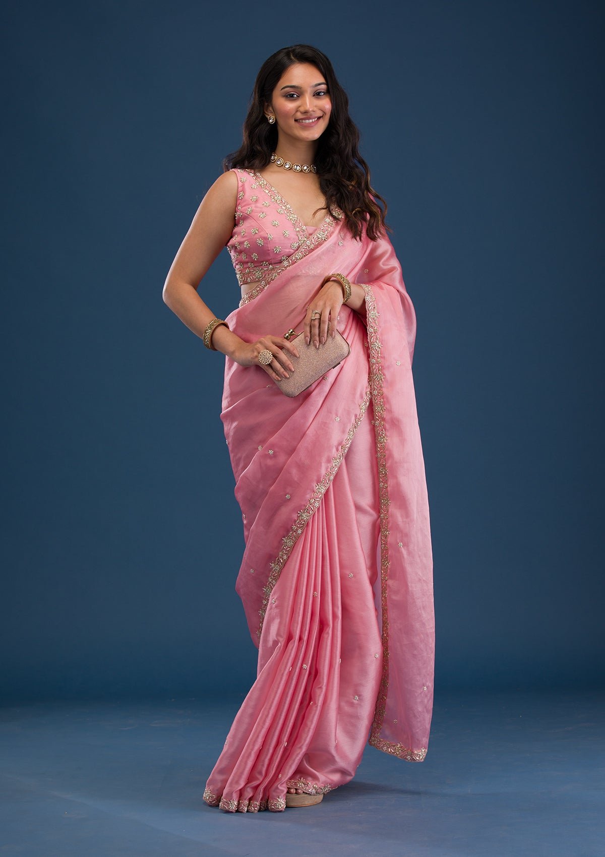 Charming Baby Pink Tissue Saree with Elegant Pearl Embellishments