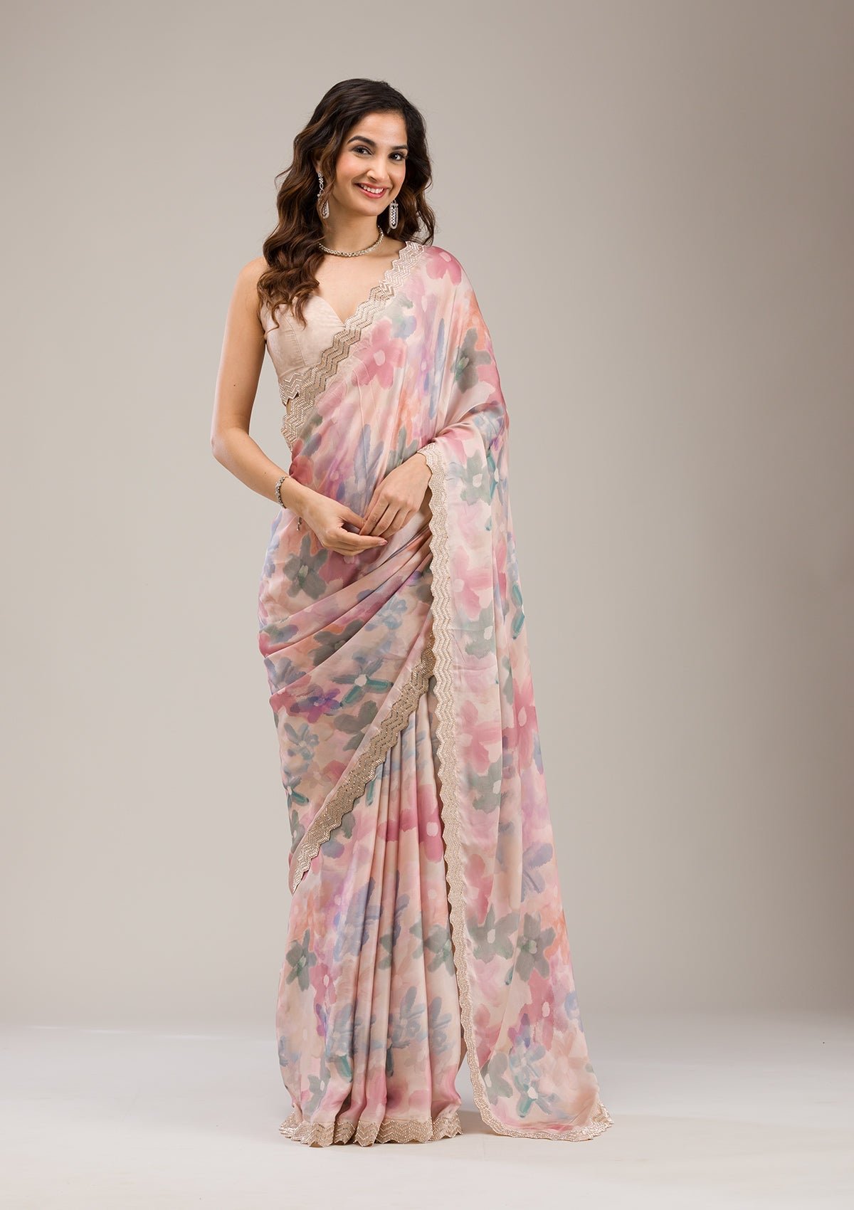 Bravix Elegant Beige Georgette Saree with Beautiful Stonework