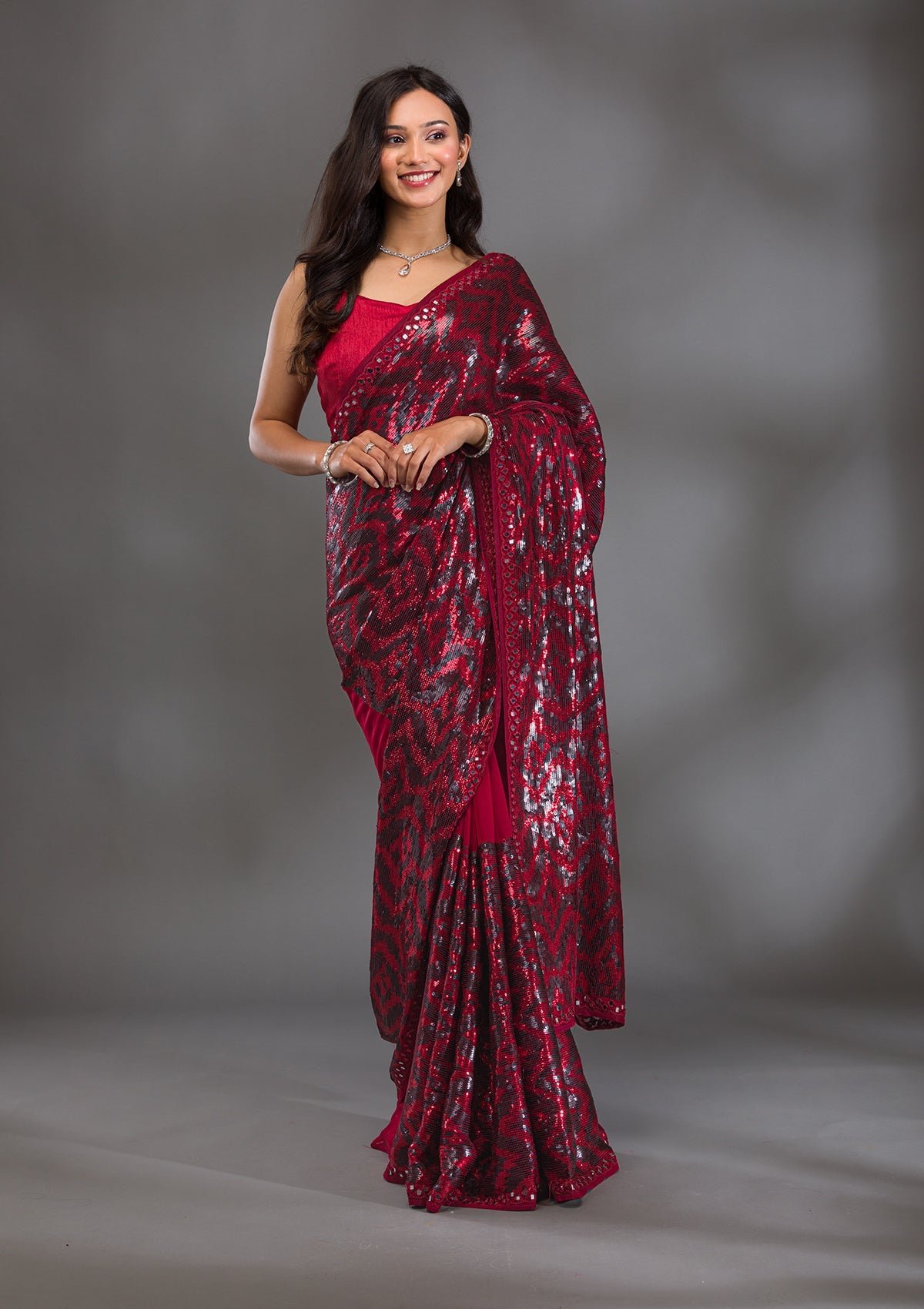 Bravix Elegant Maroon Georgette Saree with Sparkling Sequins