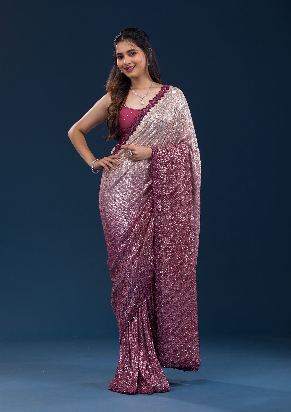 Bravix Elegant Maroon Georgette Saree Adorned with Sparkling Sequins