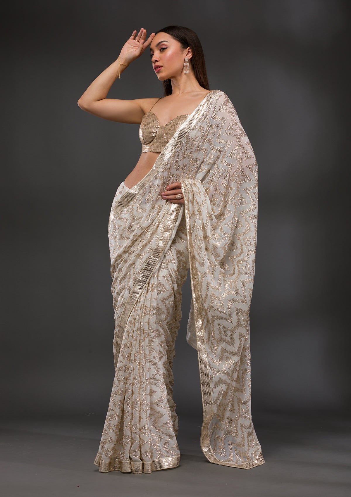 Bravix Stunning Off-White Georgette Saree Adorned with Sparkling Sequins