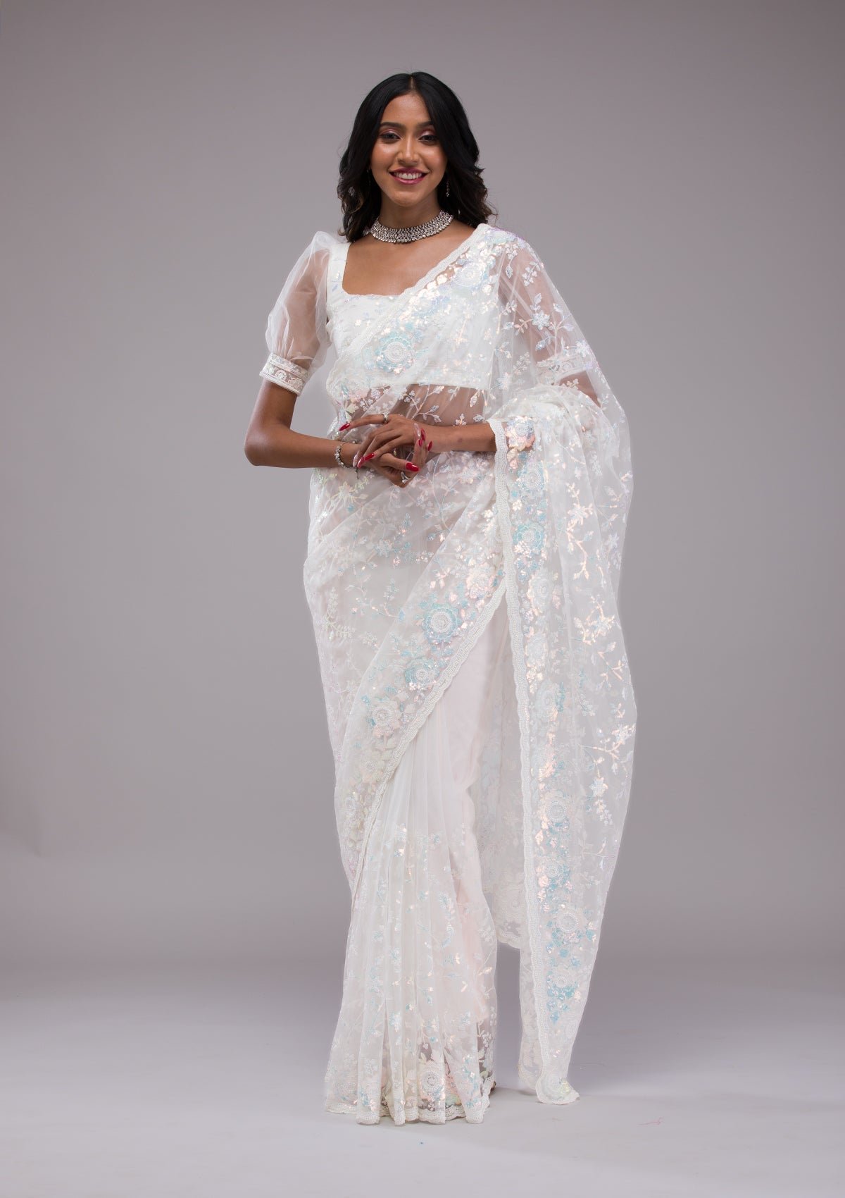 Bravix Elegant Off-White Sequined Tissue Saree for a Dazzling Look