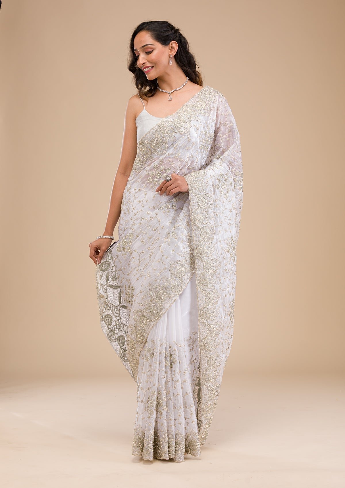 Bravix Elegant Off White Tissue Saree with Exquisite Zariwork