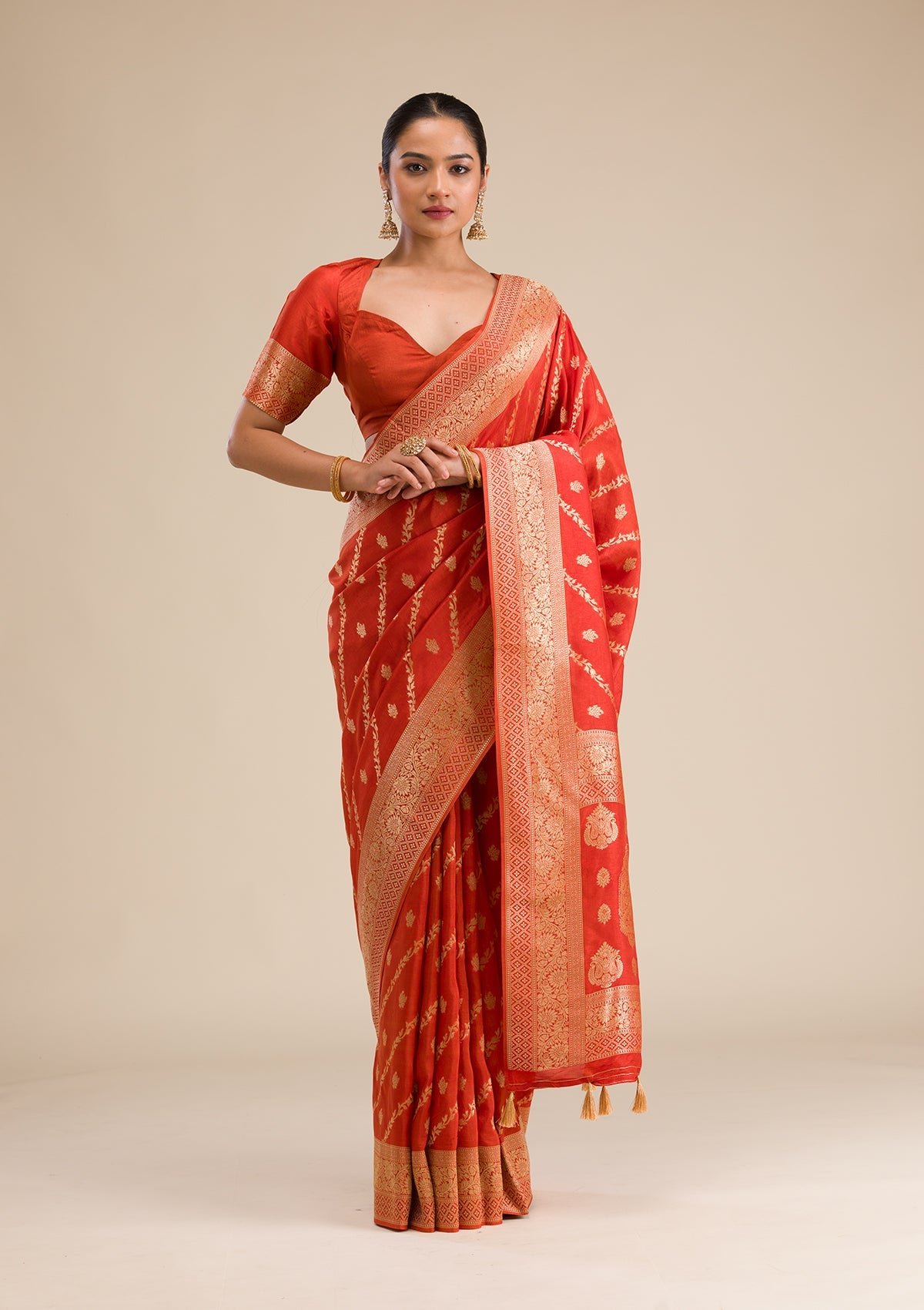 Bravix Elegant Orange Semi Crepe Saree with Stunning Zari Work