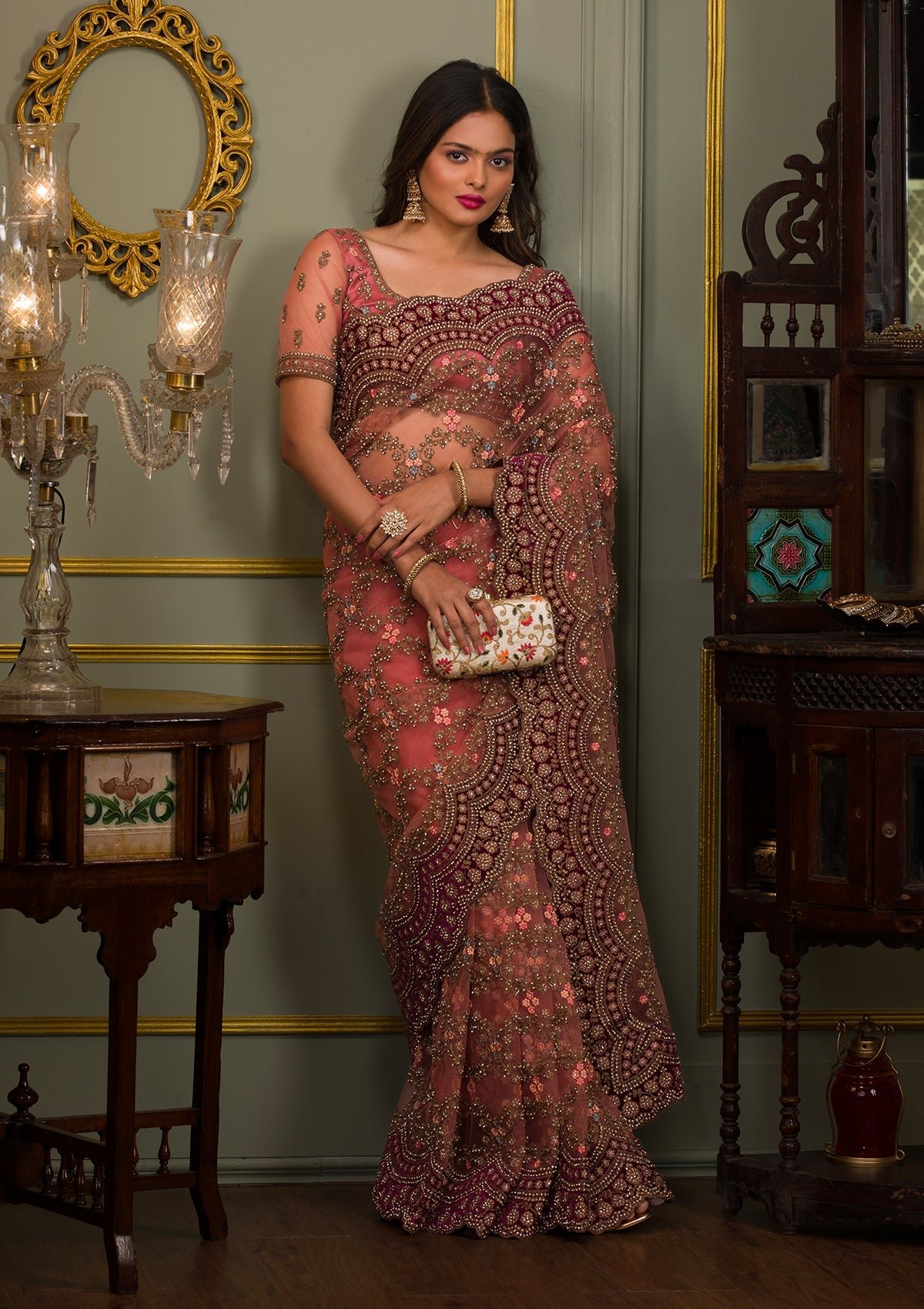 Bravix Elegant Peach Net Saree with Stonework Accents
