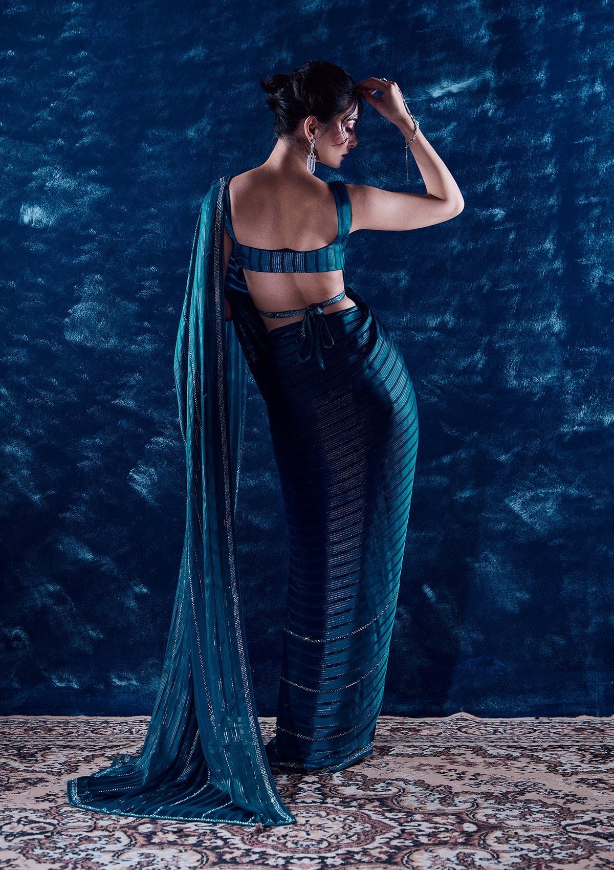 Elegantly Crafted Peacock Blue Swarovski Georgette Designer Saree - Image 2