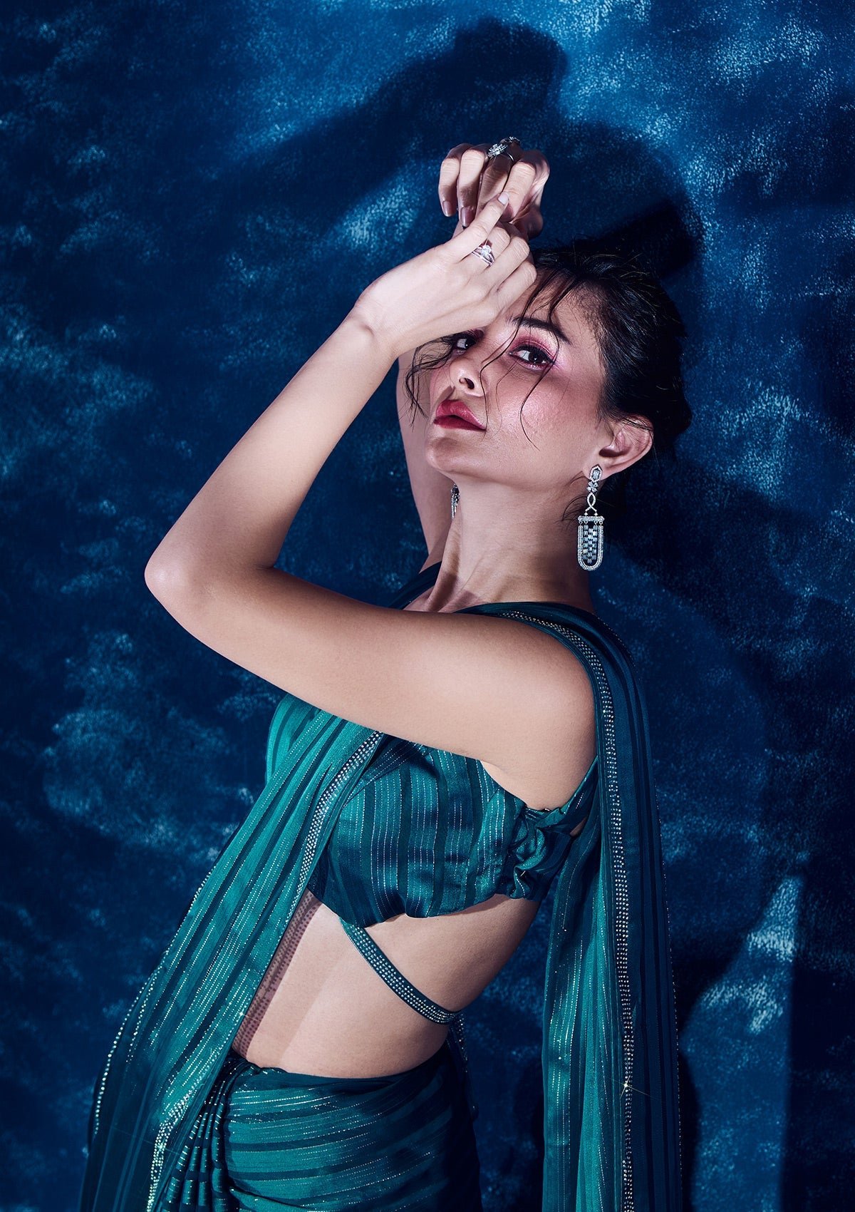 Elegantly Crafted Peacock Blue Swarovski Georgette Designer Saree - Image 4