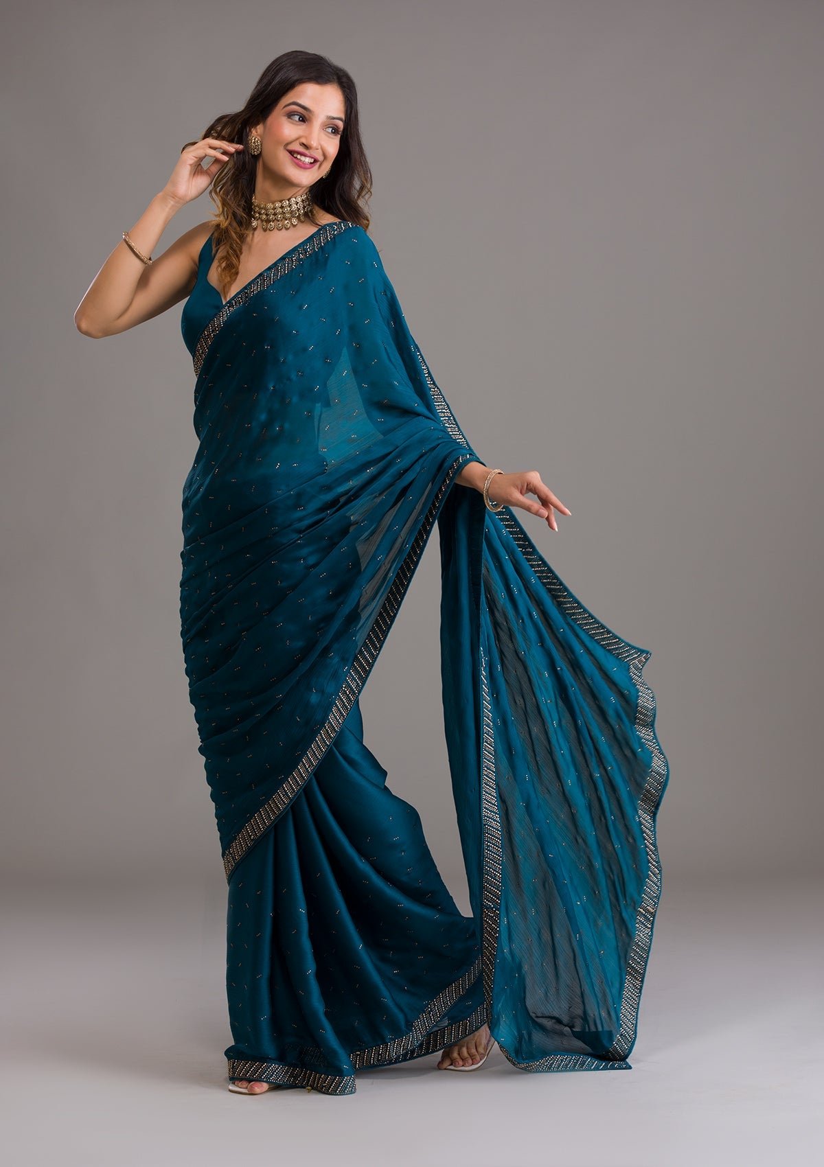 Bravix Stunning Peacock Blue Swarovski Embellished Semi Crepe Designer Saree