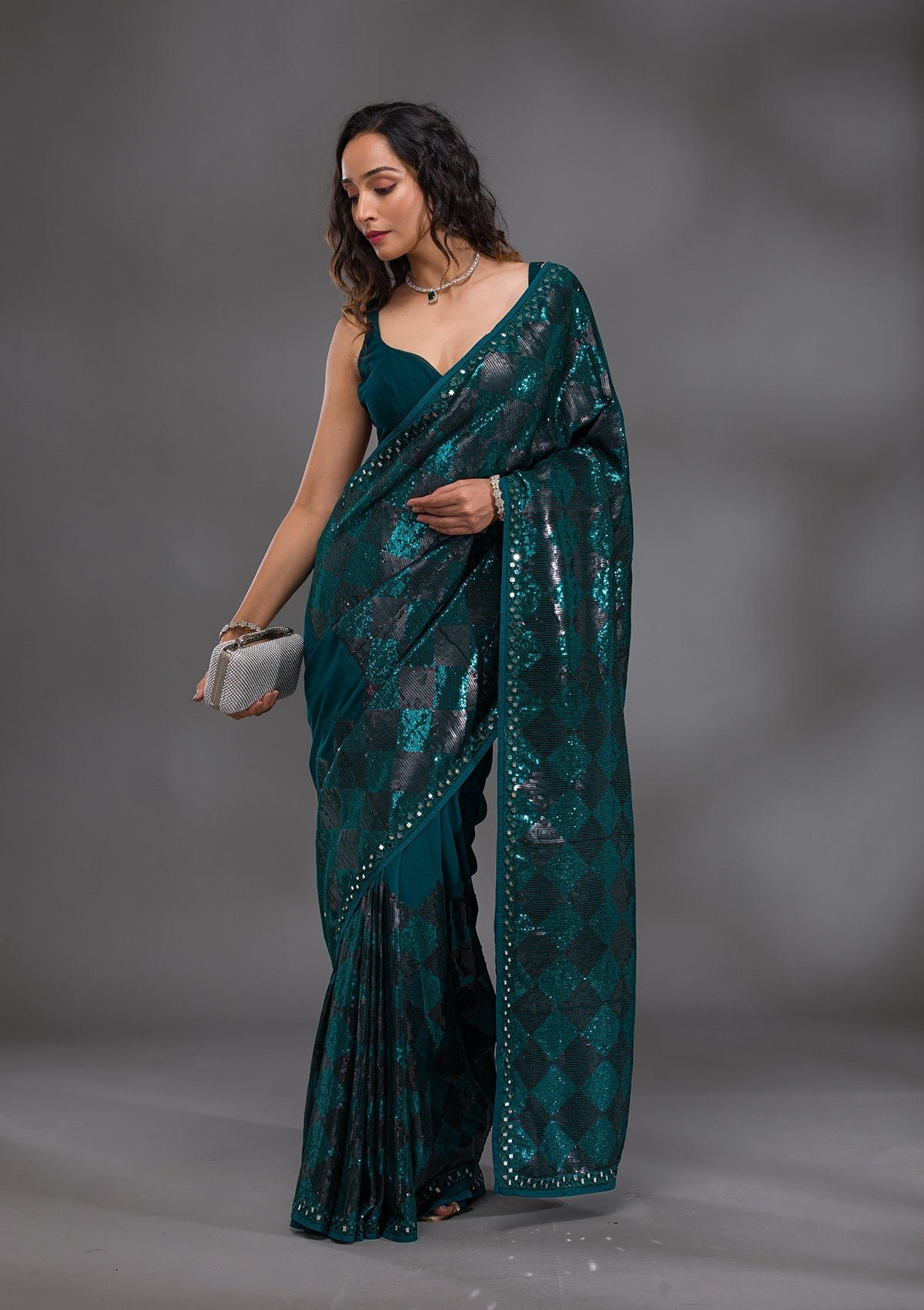Bravix Elegant Peacock Blue Georgette Saree Adorned with Sequins