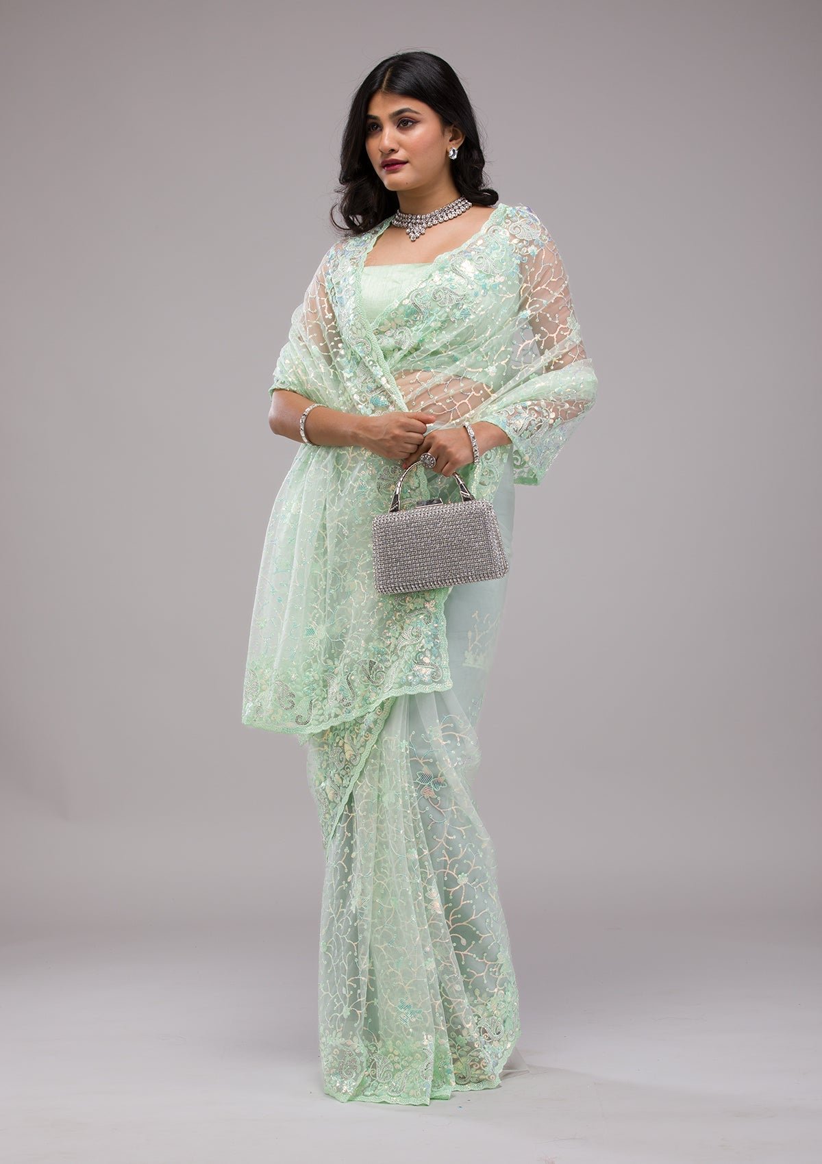 Bravix Gorgeous Pista Green Sequined Net Saree for Elegant Occasions