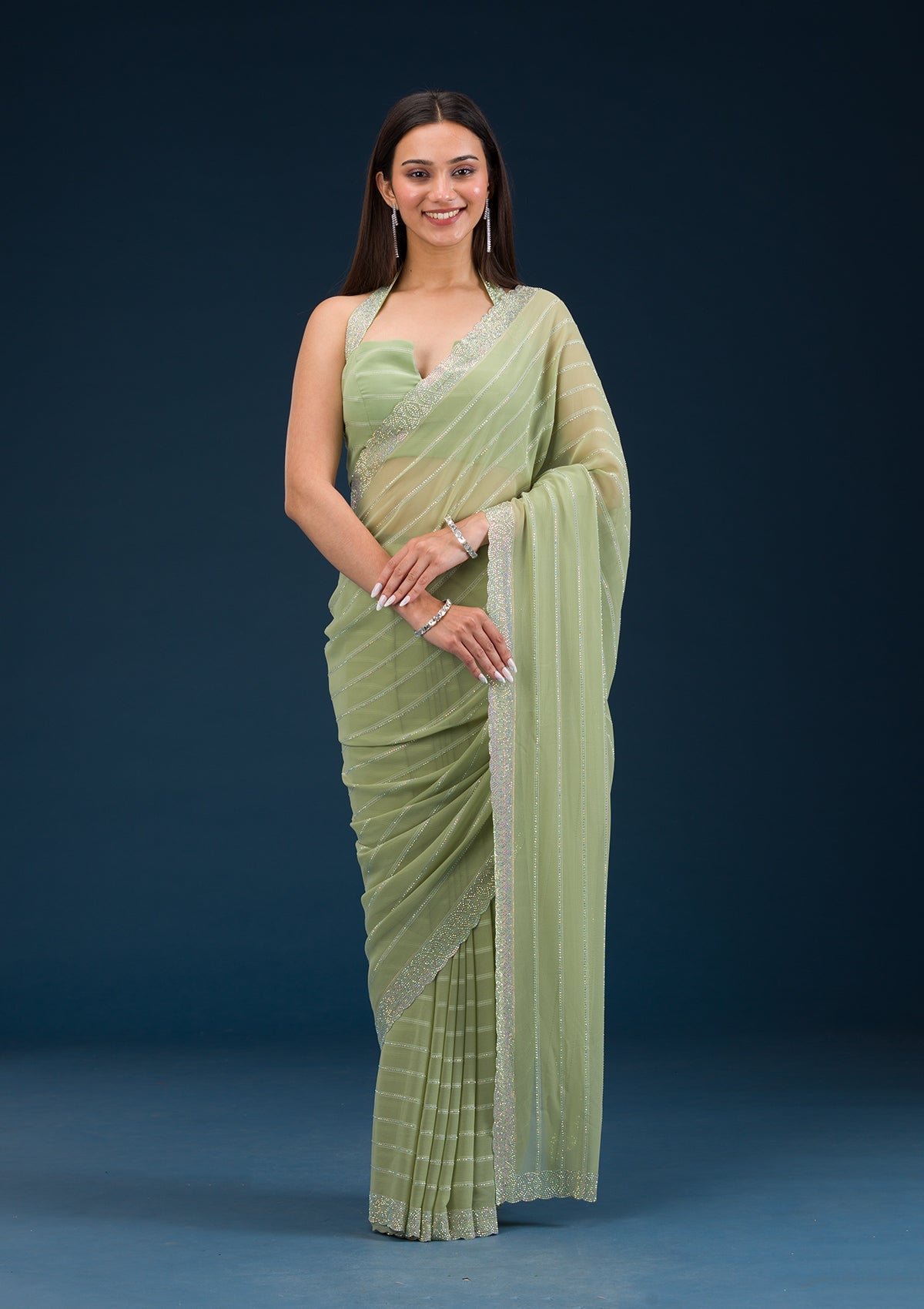 Bravix Elegant Pista Green Georgette Saree with Exquisite Stonework - Image 5