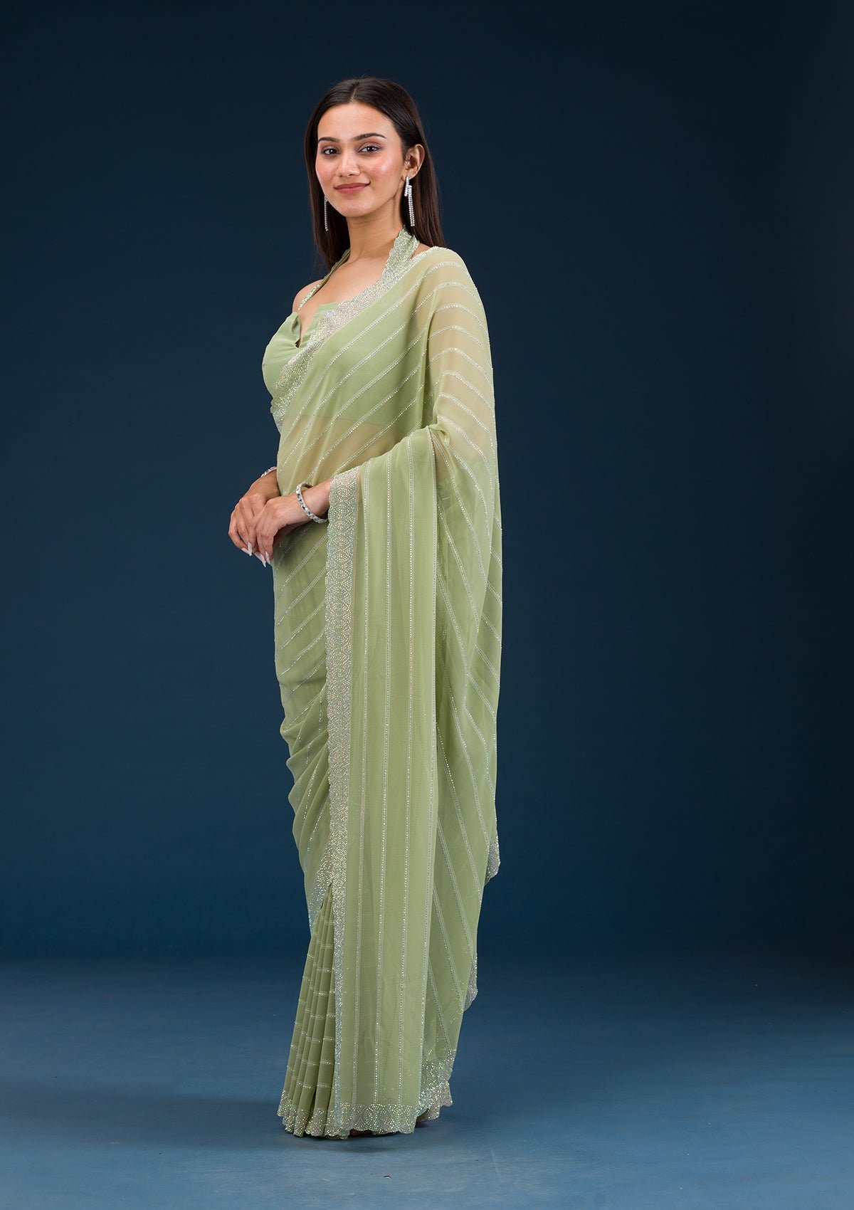 Bravix Elegant Pista Green Georgette Saree with Exquisite Stonework - Image 4