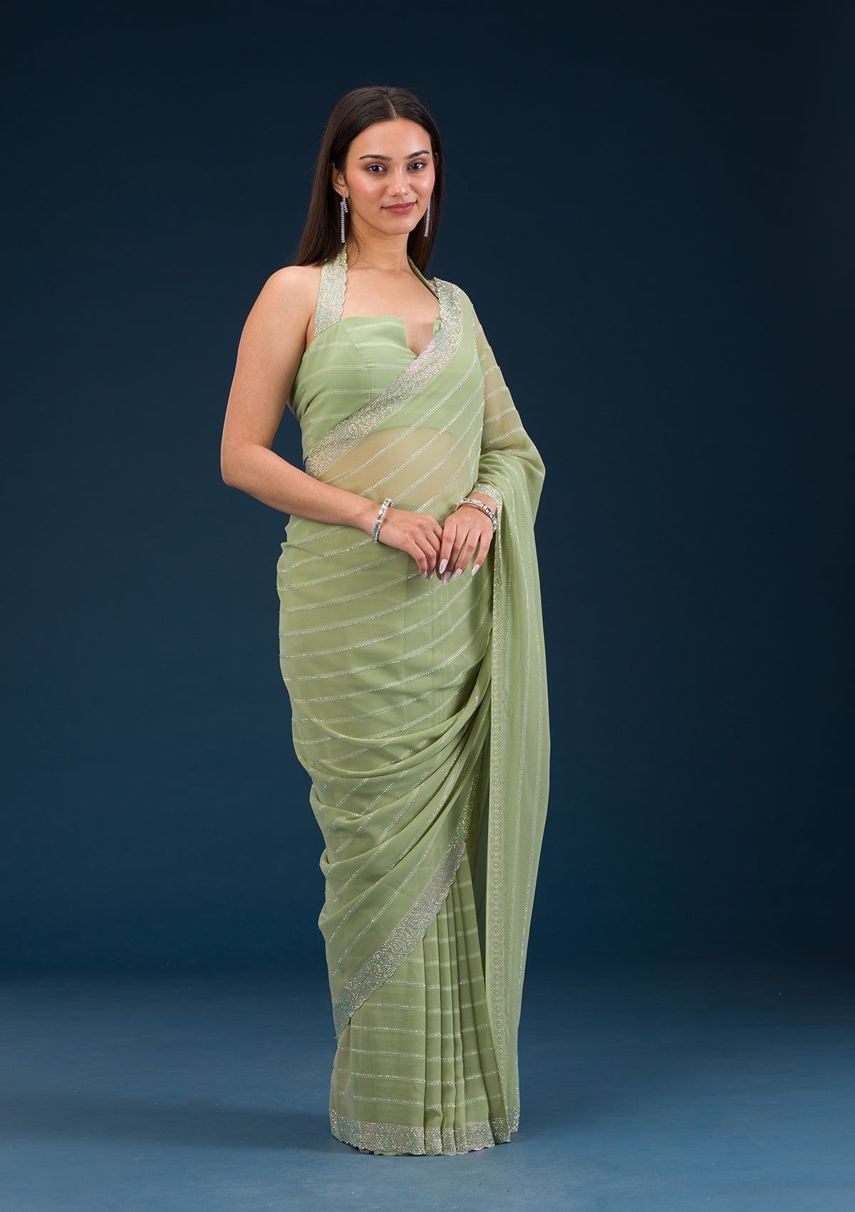 Bravix Elegant Pista Green Georgette Saree with Exquisite Stonework - Image 6
