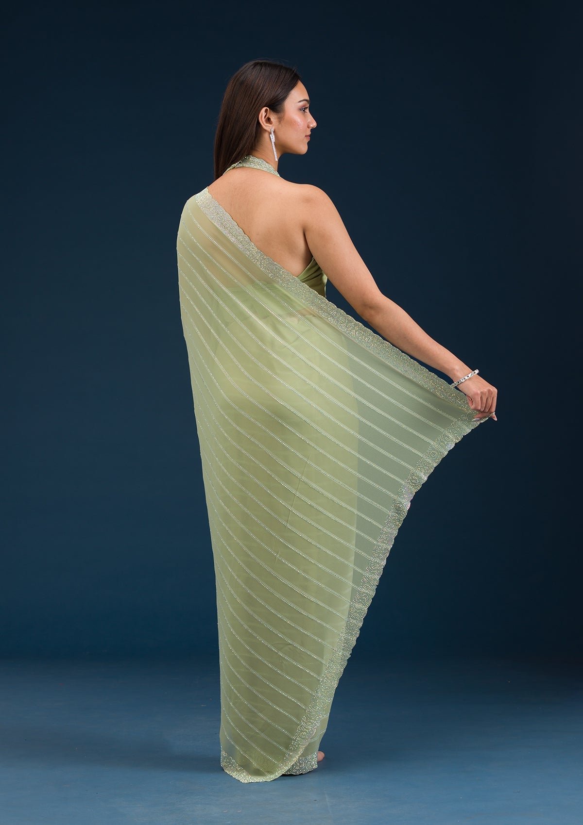 Bravix Elegant Pista Green Georgette Saree with Exquisite Stonework - Image 2