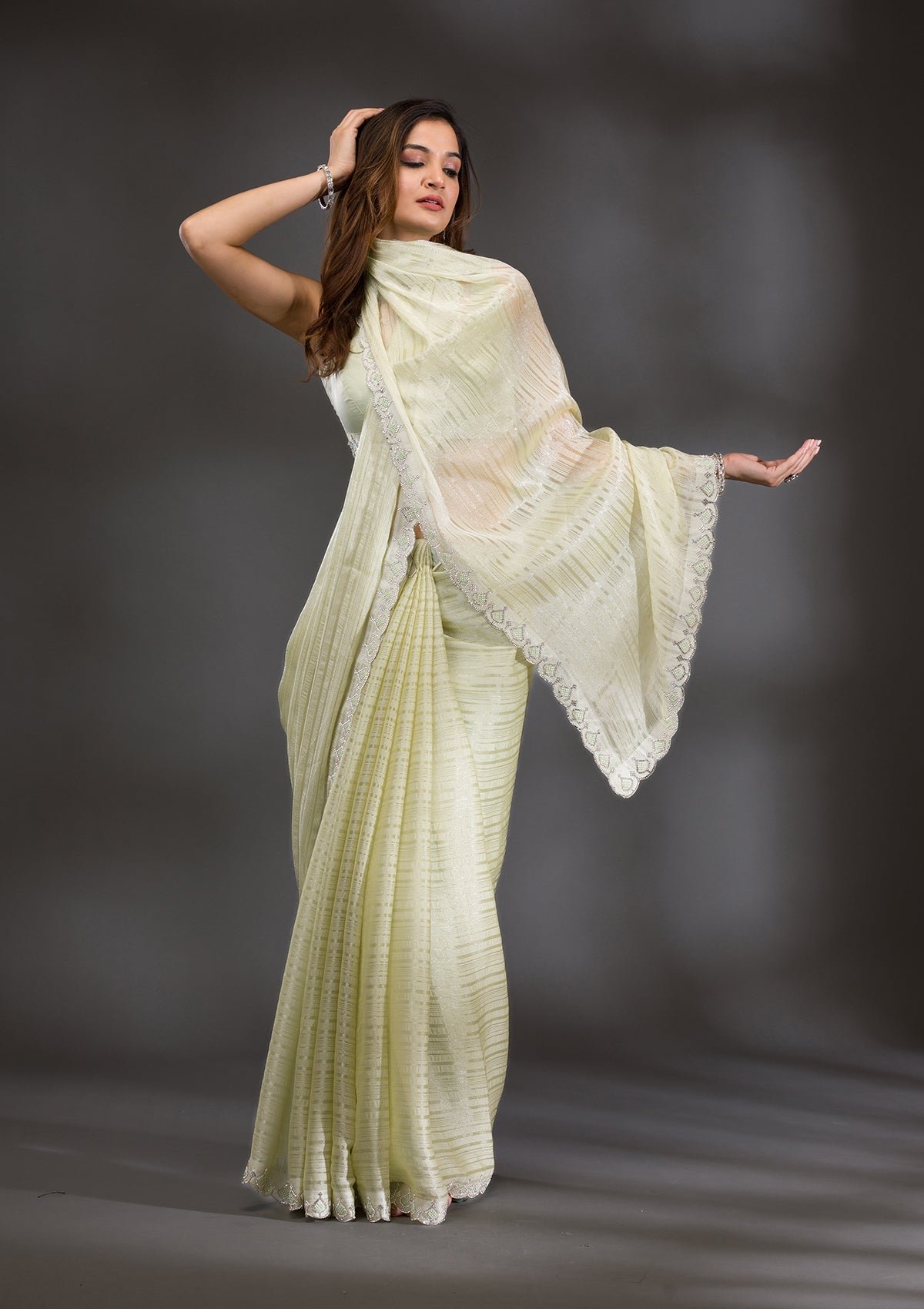 Bravix Elegant Pista Green Georgette Saree with Stunning Swarovski Accents - Image 5