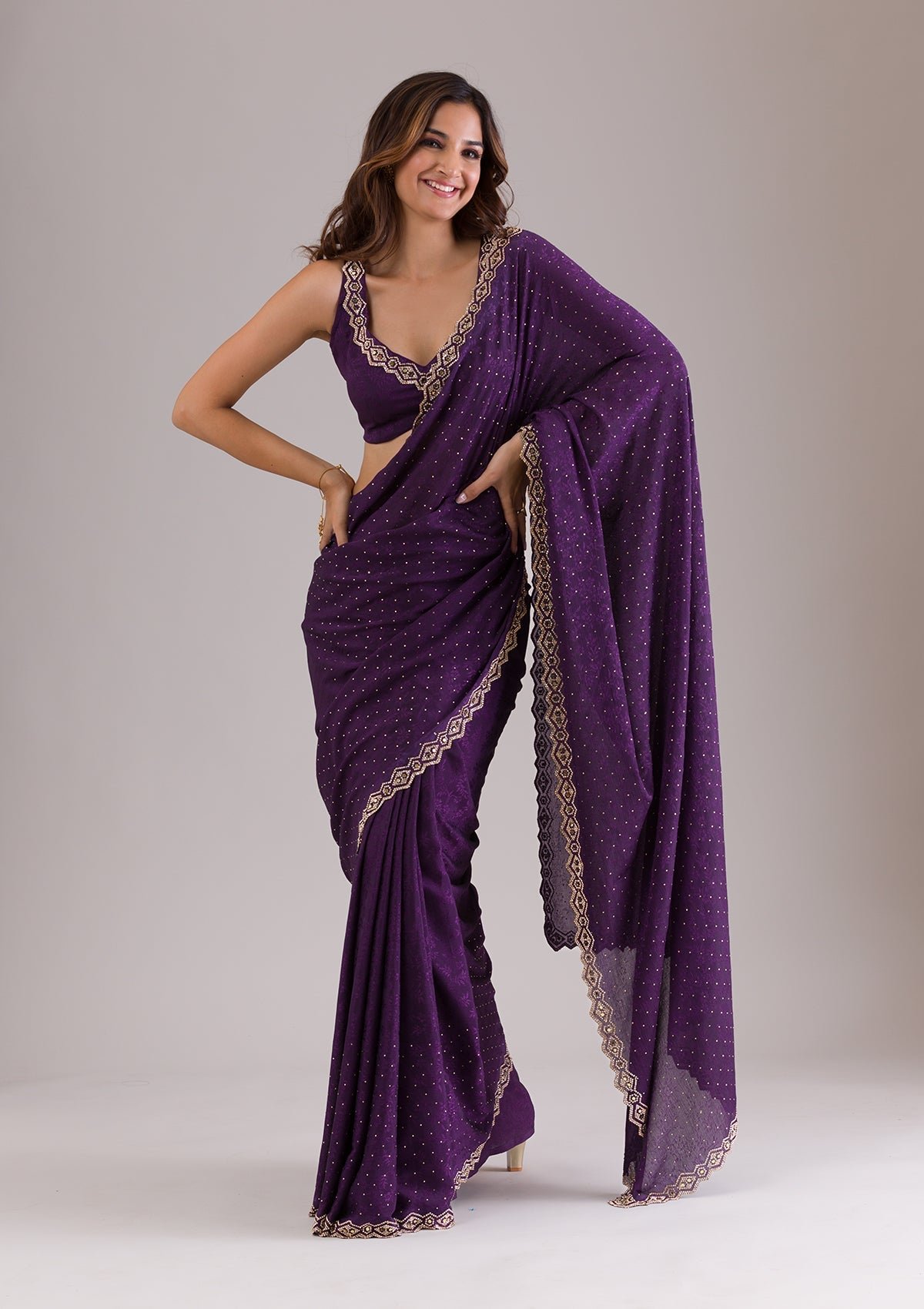 Bravix Elegant Purple Stonework Semi Crepe Saree