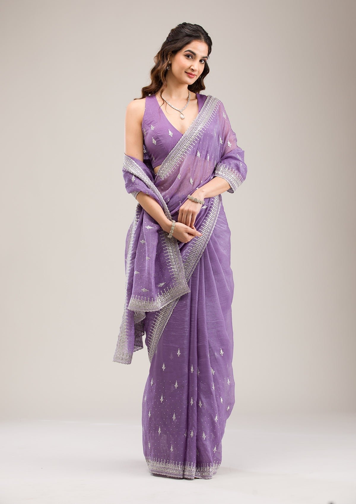 Bravix Exquisite Purple Tissue Saree with Zariwork Accents