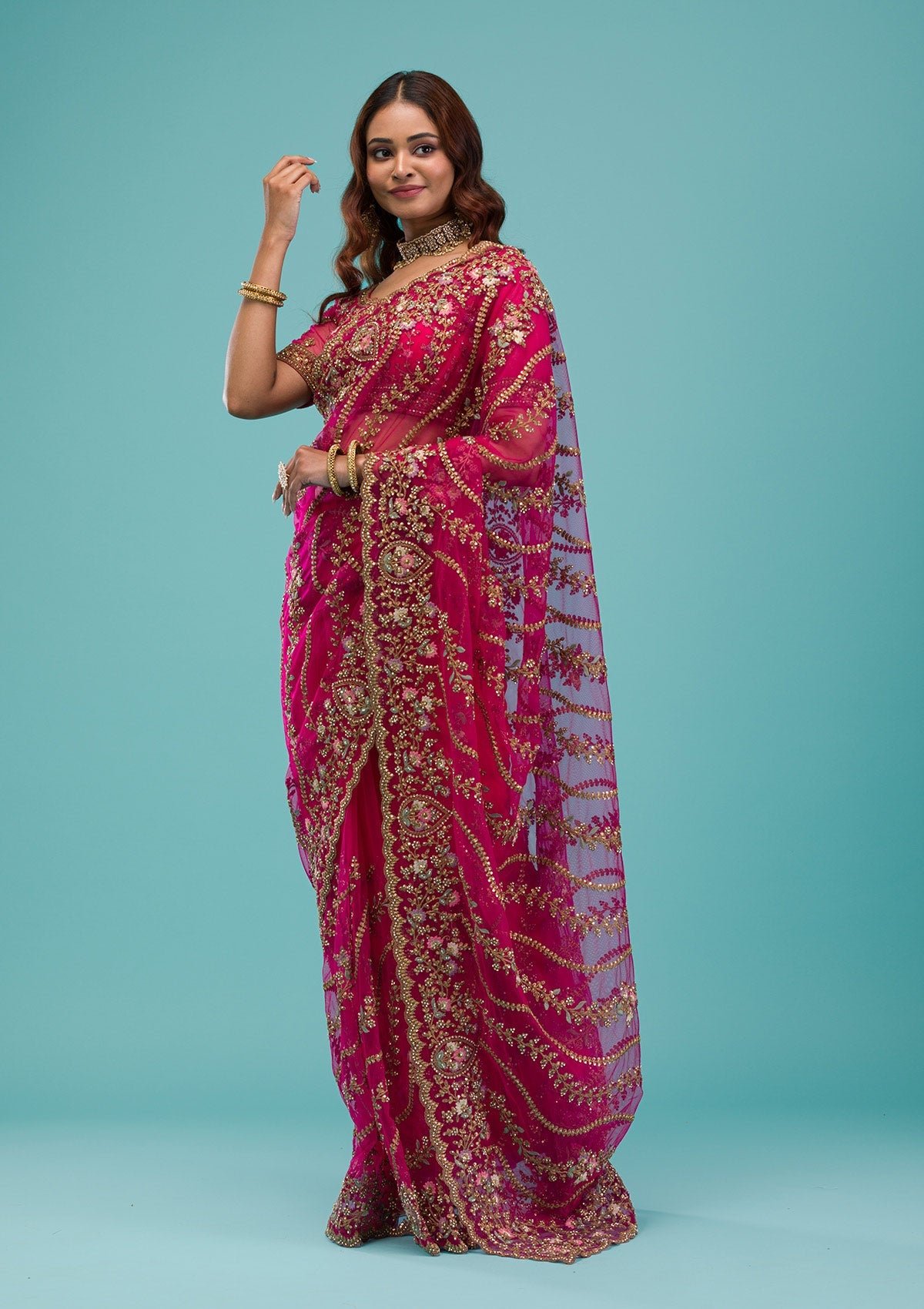 Bravix Elegant Rani Pink Net Saree with Exquisite Zari Work