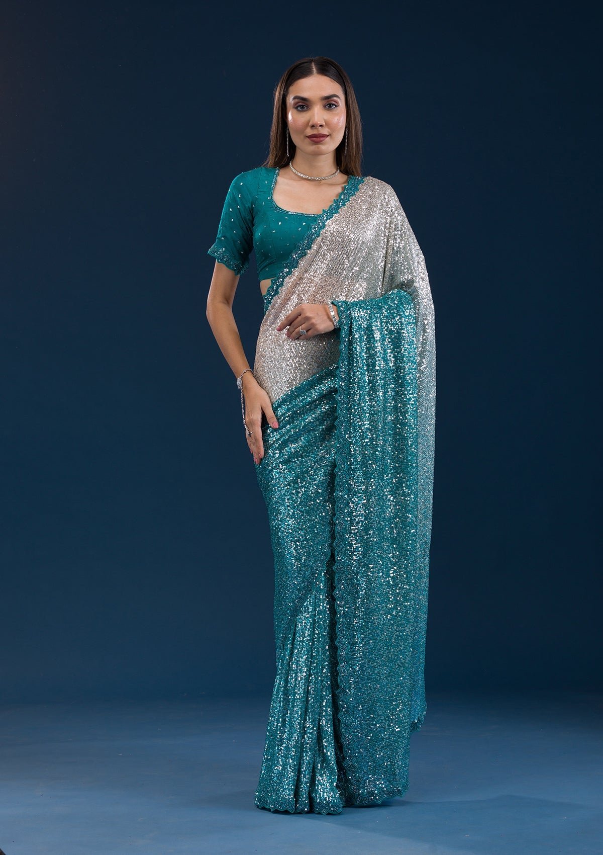 Elegant Sea Green Georgette Saree Adorned with Sparkling Sequins