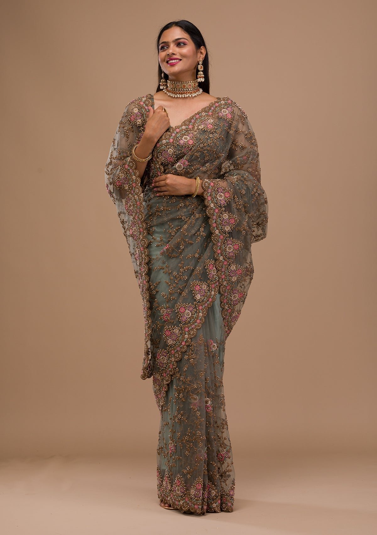 Bravix Elegant Sea Green Net Saree with Exquisite Zariwork