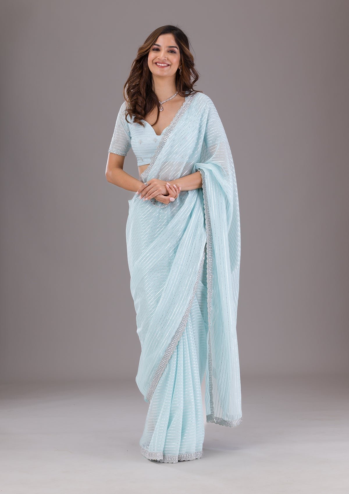 Bravix Elegant Sky Blue Stone-Embellished Georgette Saree