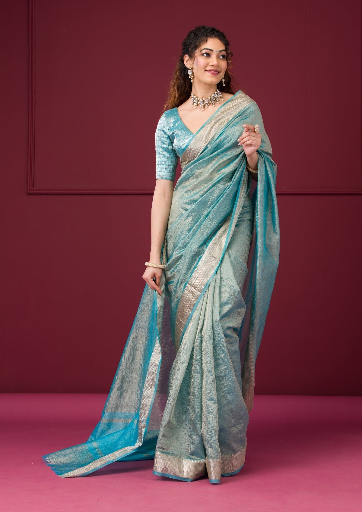 Bravix Elegant Turquoise Blue Tissue Saree with Exquisite Zariwork